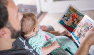 reading a book to a toddler