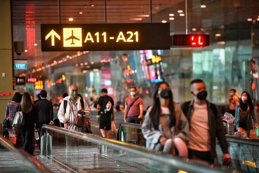 travelers at Changi Airport