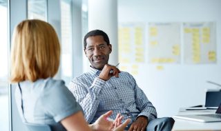 two colleagues having a conversation