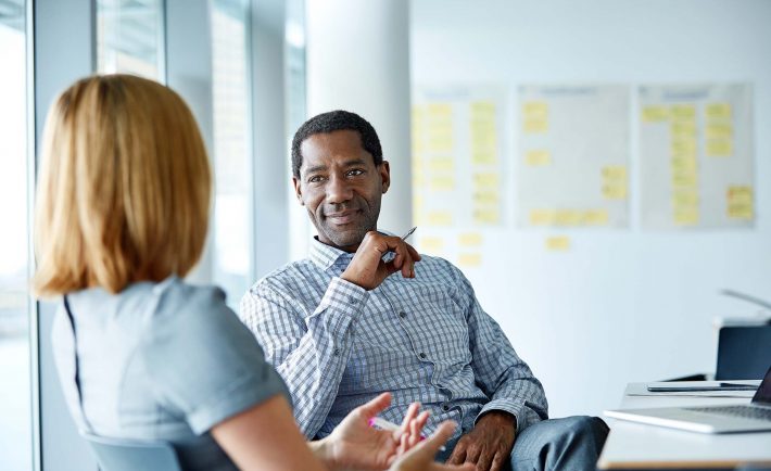 two colleagues having a conversation