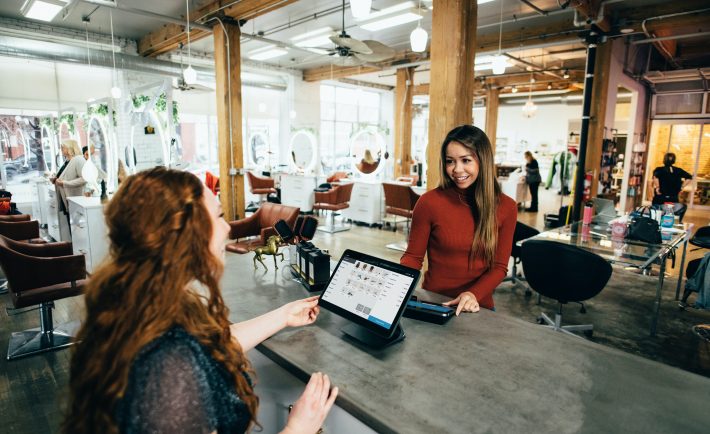 a customer and receptionist