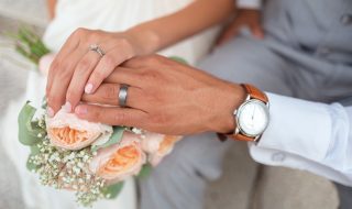 a couple's wedding rings