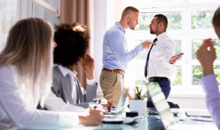 two-male-colleagues-fighting-in-office