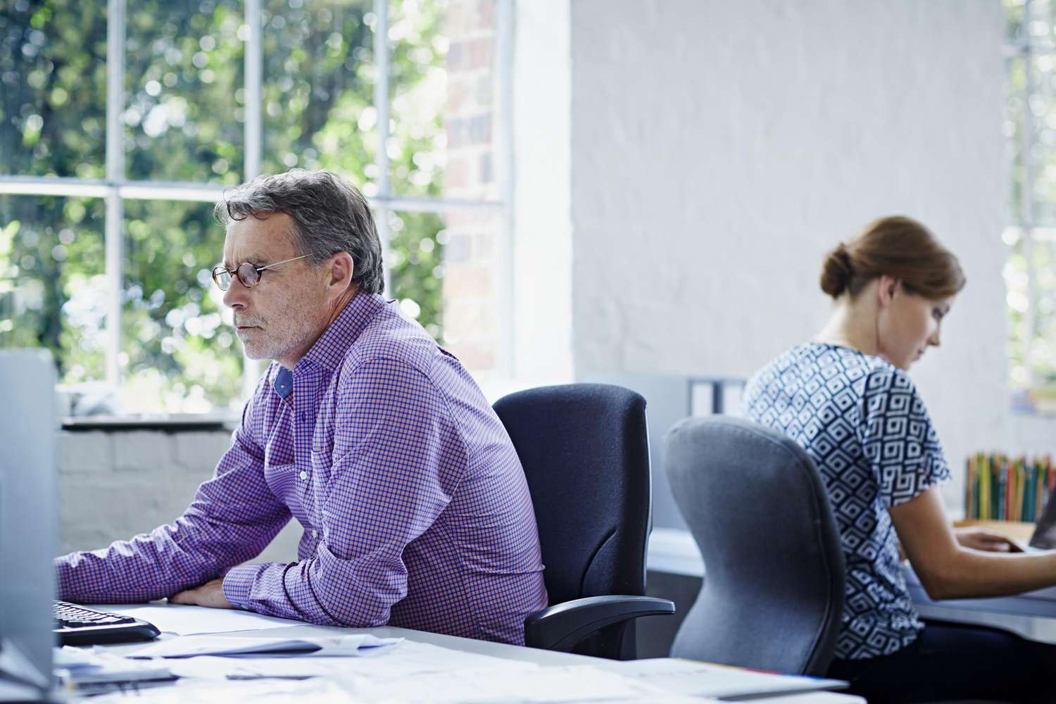 colleagues working in an open office