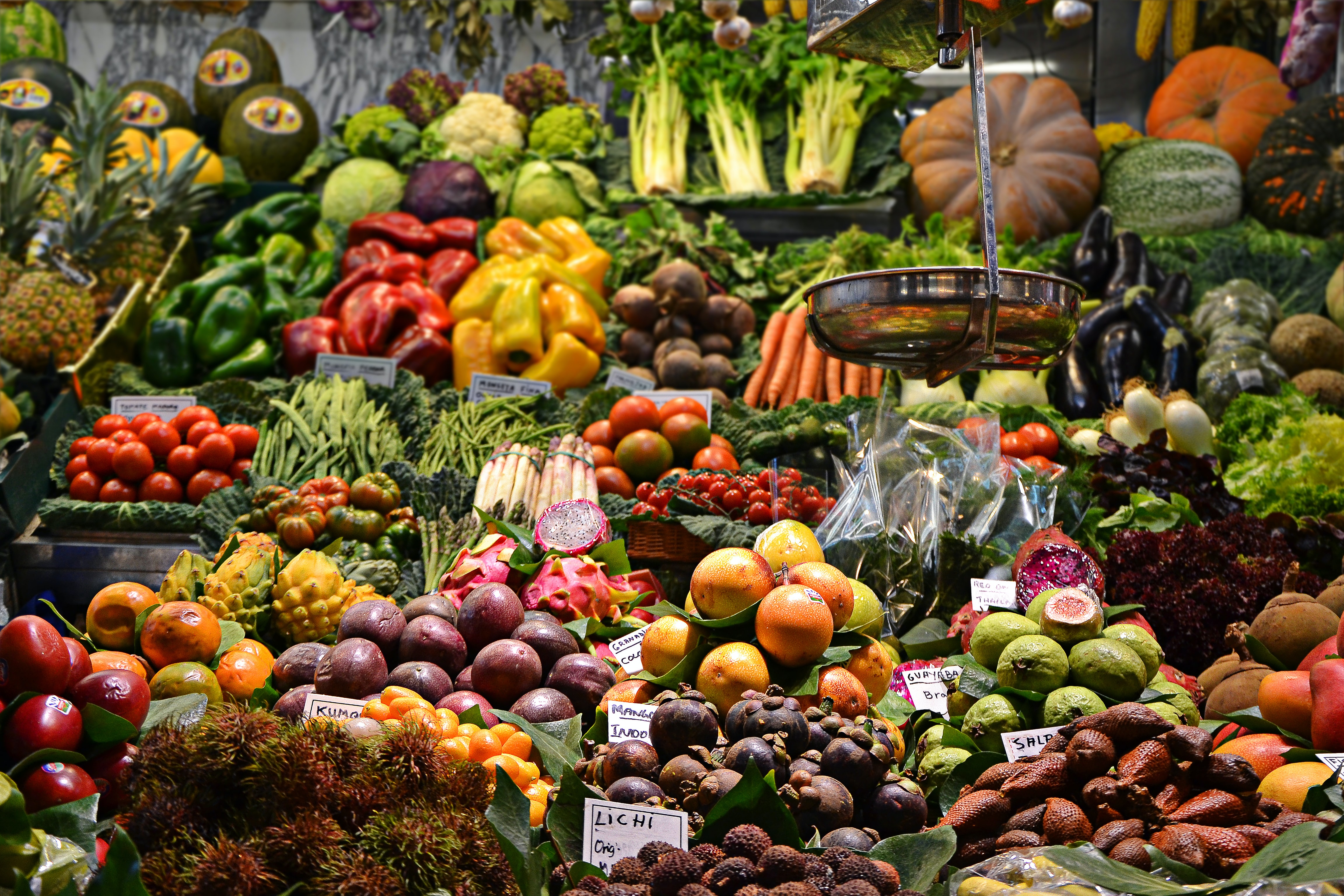 assorted fruits and vegetables in a market