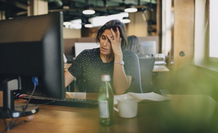 lady feeling overwhelmed at work