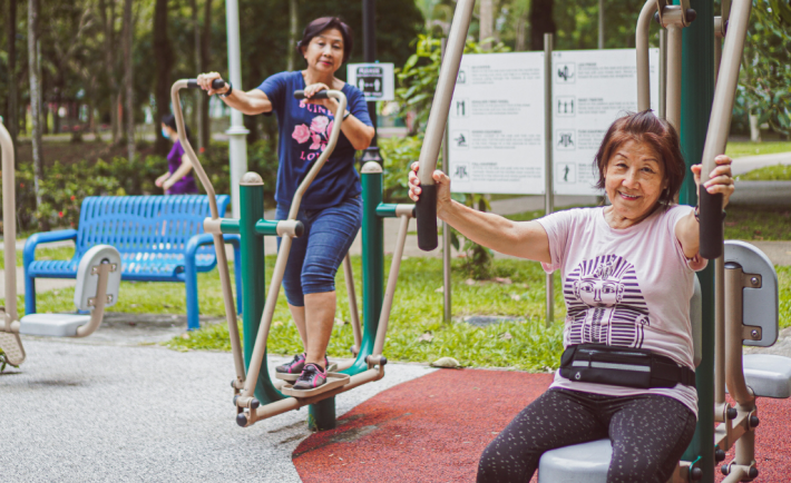 seniors exercising at the fitness corner