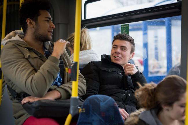 talking to a stranger in a bus