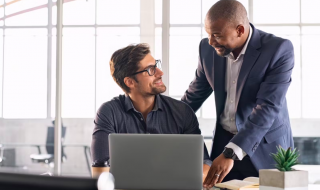 colleagues interacting in the office