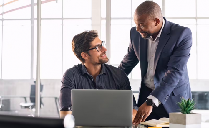 colleagues interacting in the office