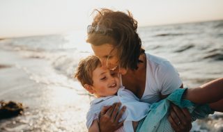 mother and child at the beach