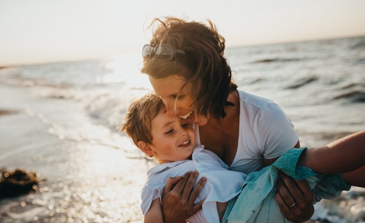 mother and child at the beach