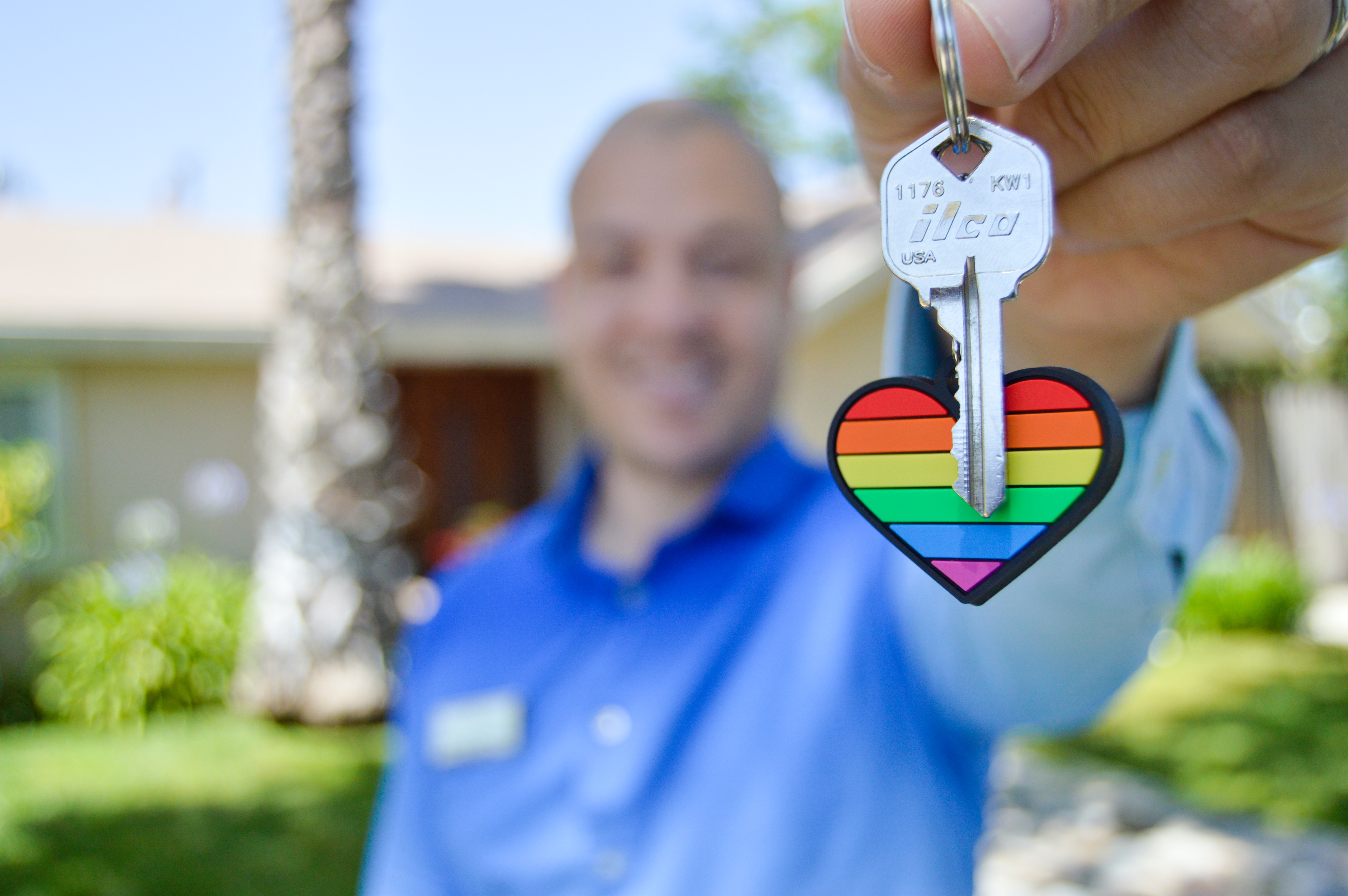 person holding a house key