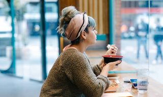 woman eating alone