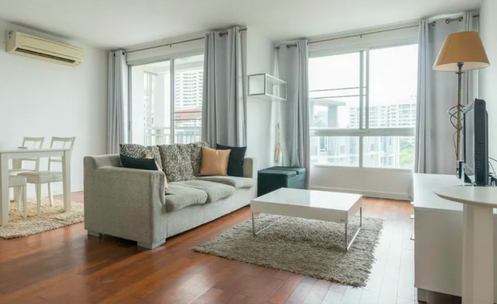 a living room with an air-conditioner