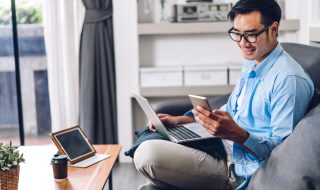 young asian man working from home