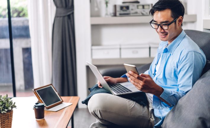 young asian man working from home