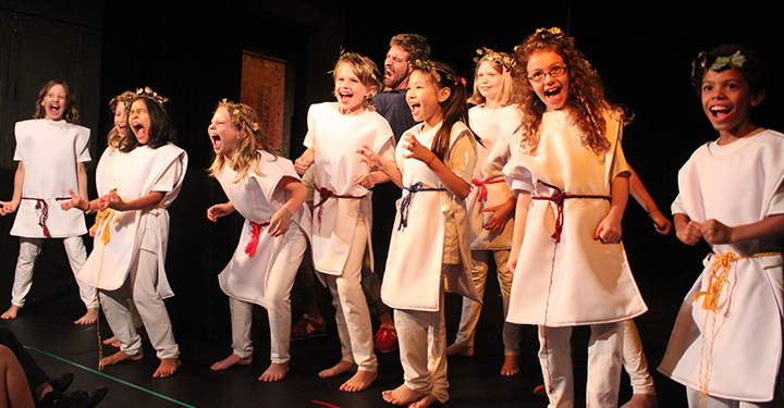 kids having fun acting on stage