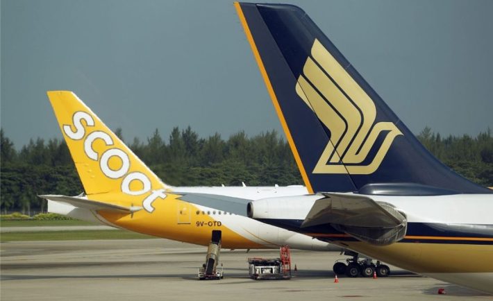 scoot and singapore airlines side by side