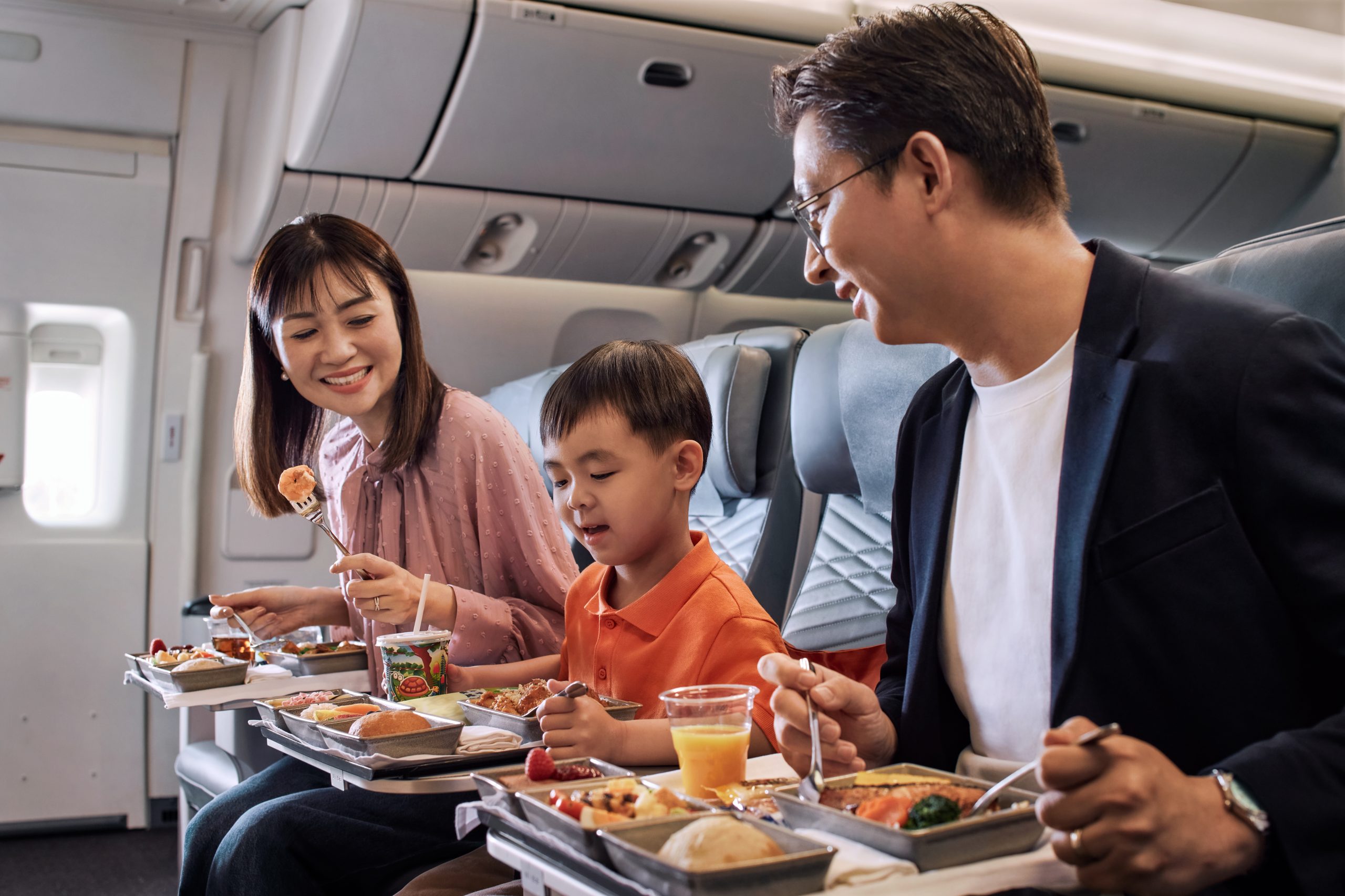 SIA Premium Economy_Family Enjoying Meals