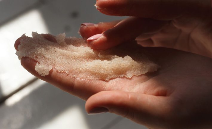 body scrub on a person's hands