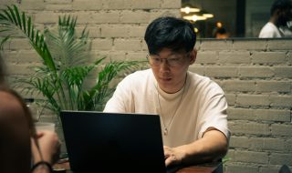 a man working on his laptop