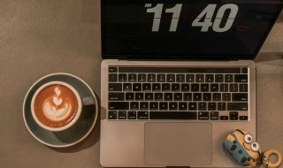 coffee and a laptop on a table